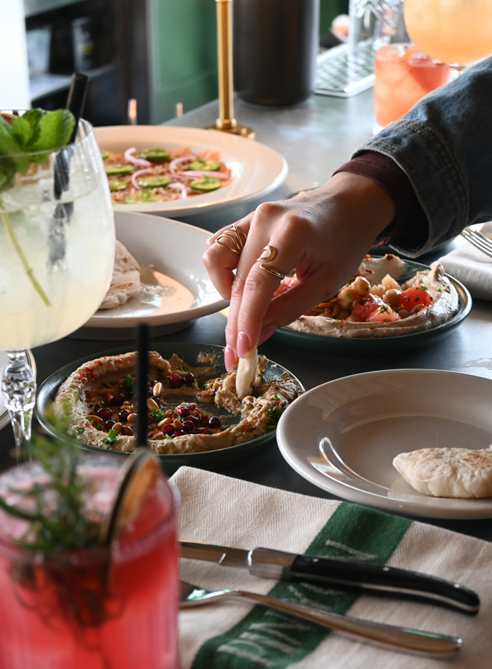 Happy hour at Pinyon features deals on rotating shareable and hummus selections as well as handcrafted cocktails, wine and beers.